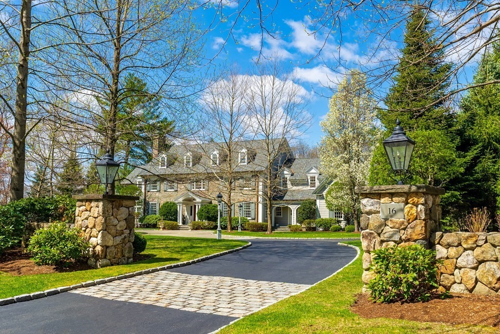 a view of a building with a yard