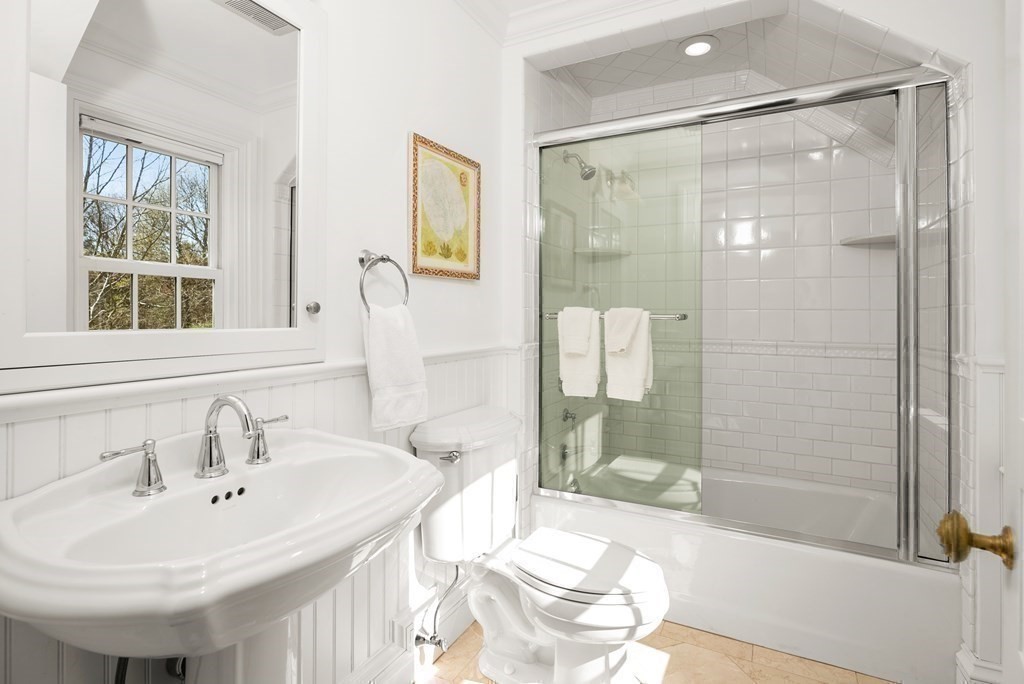 16 Sanderson Lane Weston, MA 02493 - Photo 19 of 39 a bathroom with a sink and a mirror