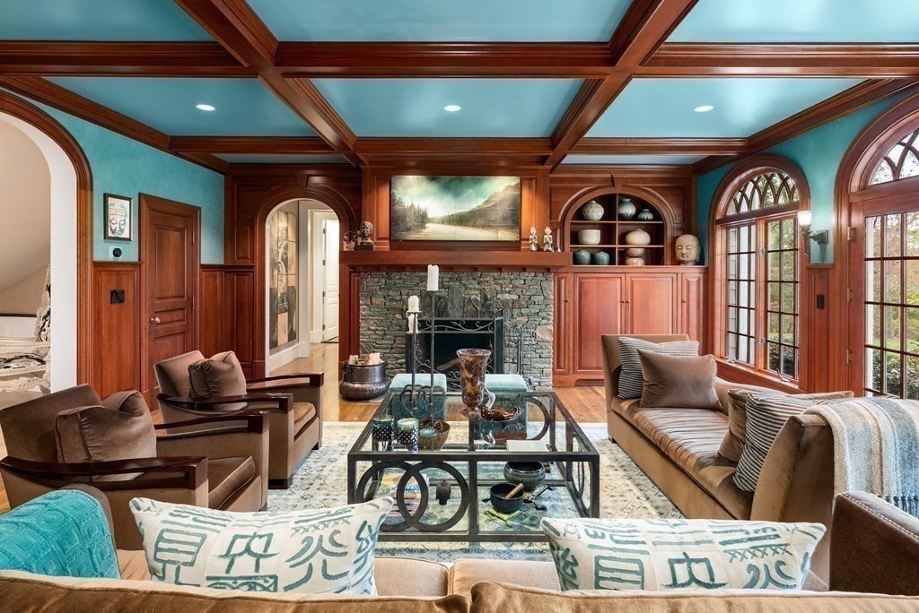 16 Sanderson Lane Weston, MA 02493 - Photo 28 of 39 a living room with furniture fireplace and a large window