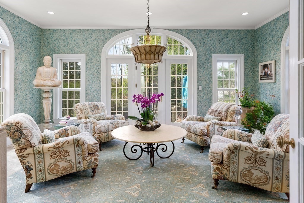16 Sanderson Lane Weston, MA 02493 - Photo 9 of 39 a living room with furniture and a chandelier