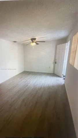 a view of a room with a window