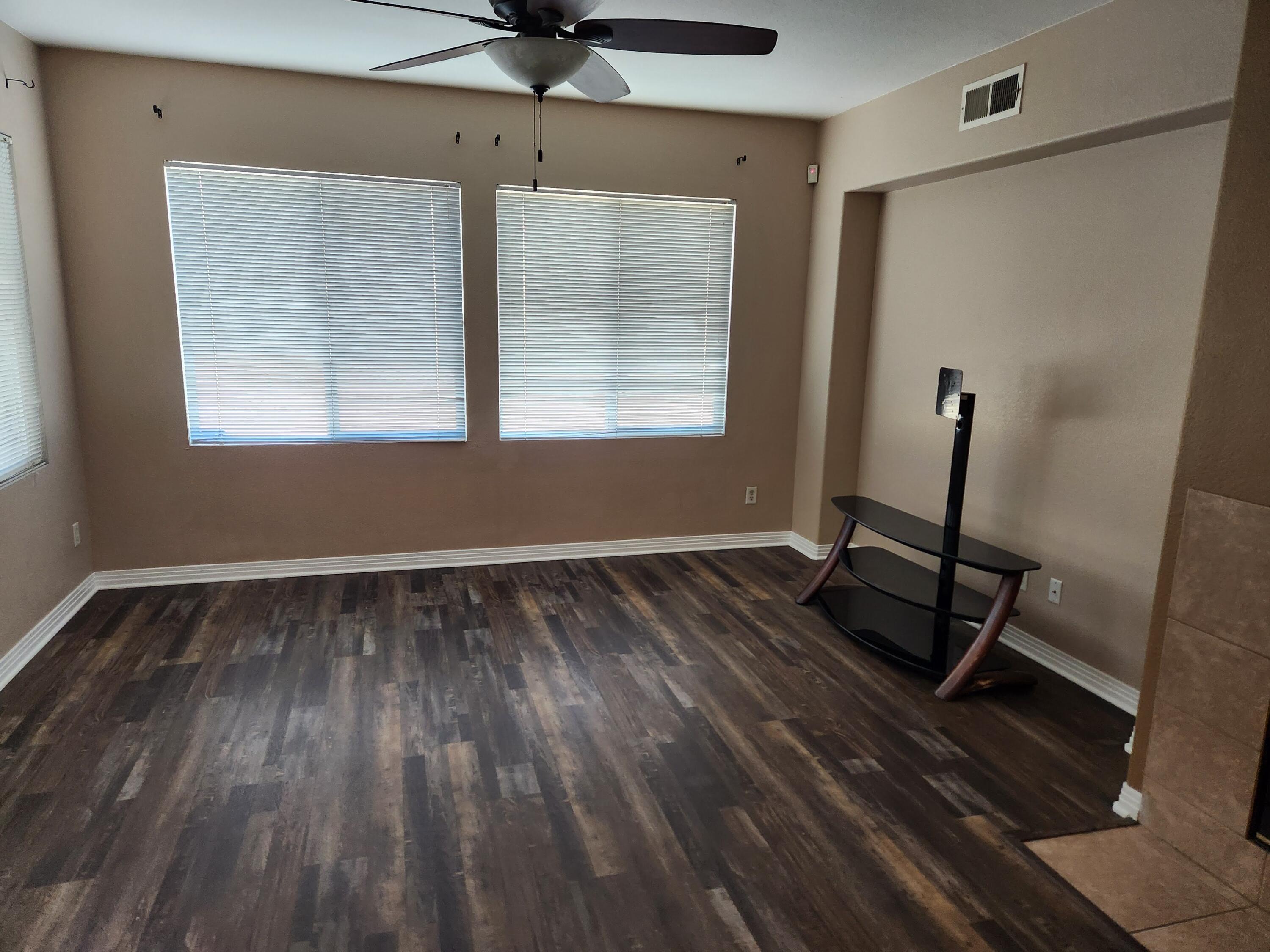 84476 Ruebens Way Coachella, CA 92236 - Photo 13 of 47 a room with wooden floor and windows