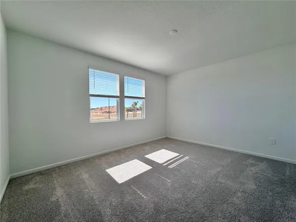 an empty room with an entryway