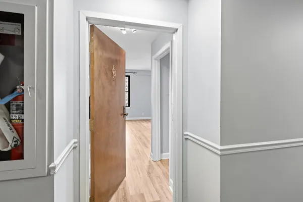 a kitchen with stainless steel appliances granite countertop a refrigerator a stove a sink and dishwasher