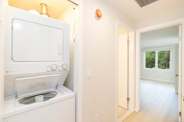 a bathroom with a sink mirror toilet and bathtub