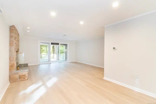 a kitchen with stainless steel appliances a stove microwave and refrigerator