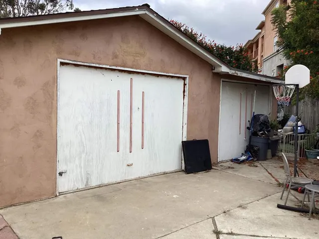 a view of a garage with furniture