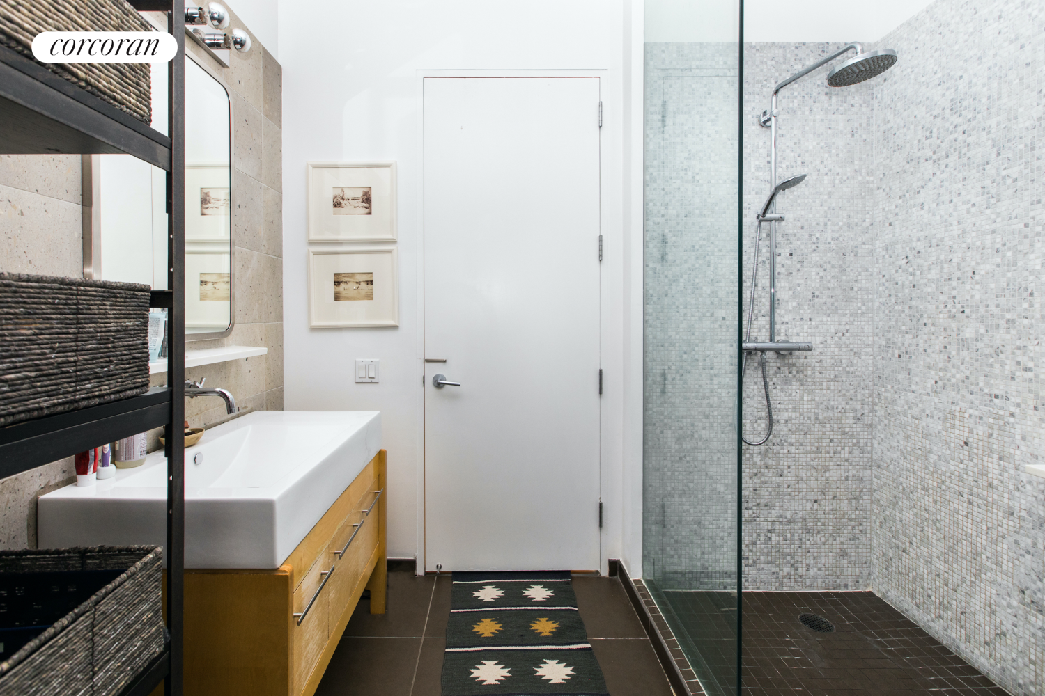 27-28 Thomson Avenue, Unit 228 Queens, NY 11101 - Photo 5 of 17 a bathroom with a sink and a shower