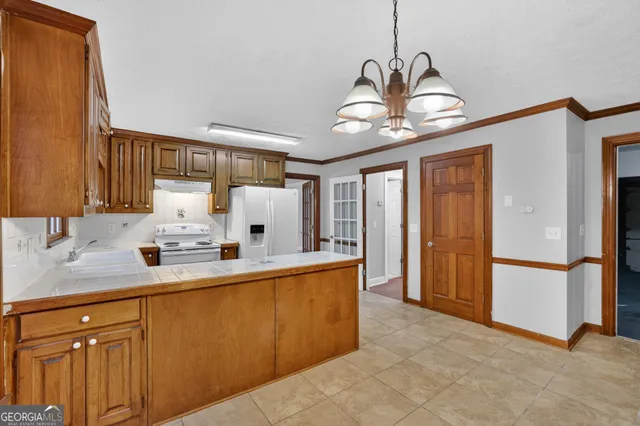 $309,900 | 6385 Southland Forest Drive, Stone Mountain, GA 30087