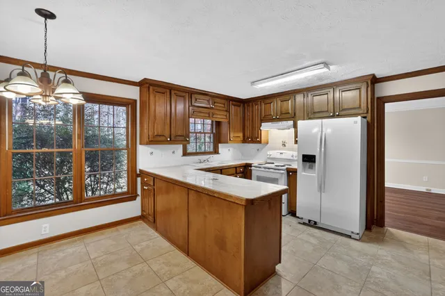 $309,900 | 6385 Southland Forest Drive, Stone Mountain, GA 30087