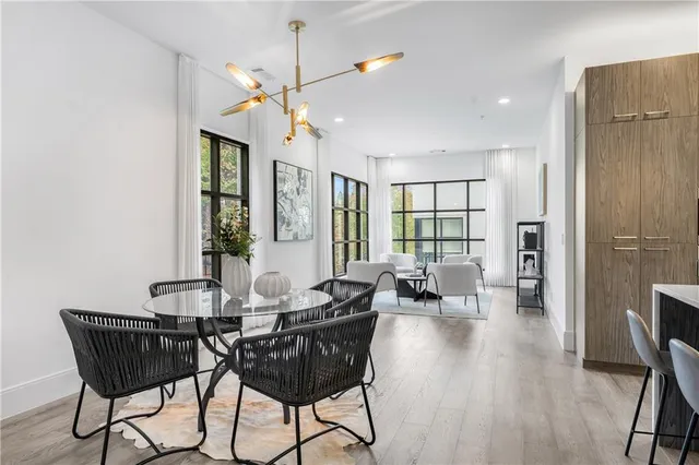 a view of a dining room with furniture window and outside view