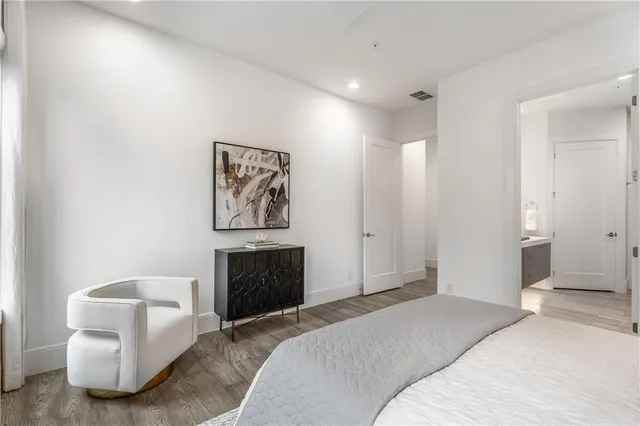 a bedroom with furniture and a bed