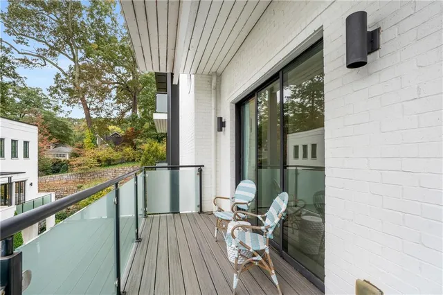 a view of balcony with furniture