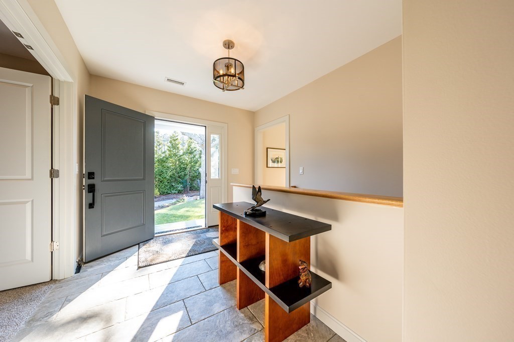 288 Training Field Road Chatham, MA 02633 - Photo 2 of 27 a room with furniture and window