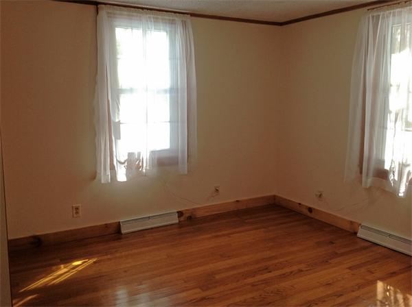 235 Glendale Road Northampton, MA 01062 - Photo 14 of 15 an empty room with wooden floor and windows