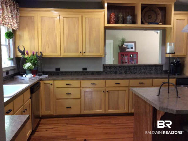 13848 Elmwood Court Stapleton, AL 36578 - Photo 5 of 27 Lots of cabinets and counter tops make this kitchen a joy.