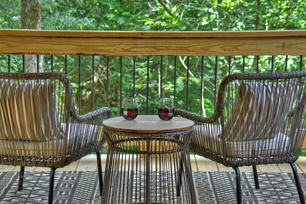 135 Windy Valley Lane Blue Ridge, GA 30513 - Photo 31 of 63 a view of a balcony with wooden floor