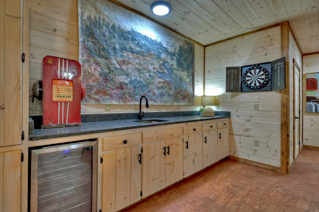 135 Windy Valley Lane Blue Ridge, GA 30513 - Photo 49 of 63 a kitchen with cabinets and window
