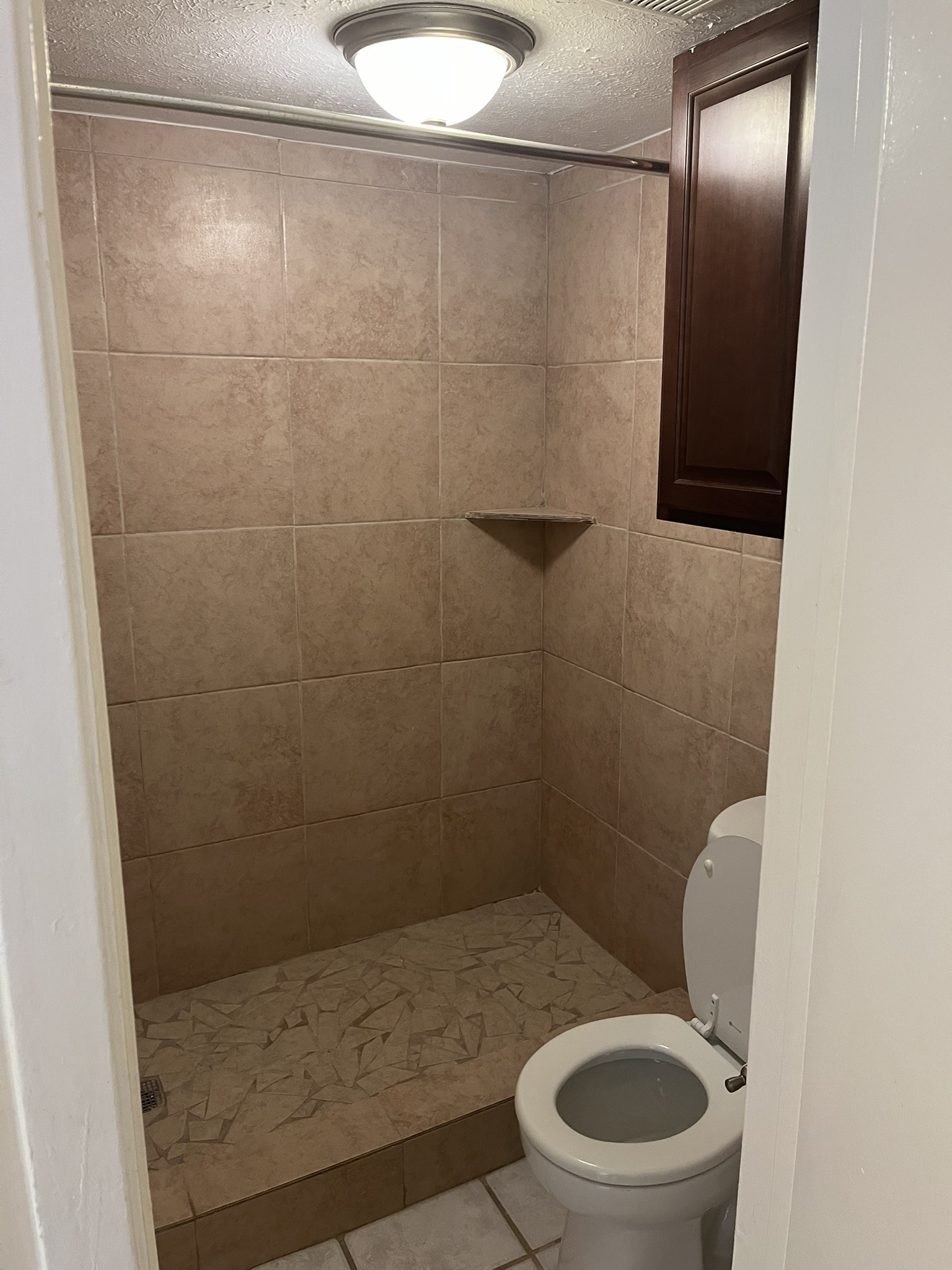 1275 Witte Road, Unit 14 Houston, TX 77055 - Photo 13 of 13 a bathroom with a toilet and a shower