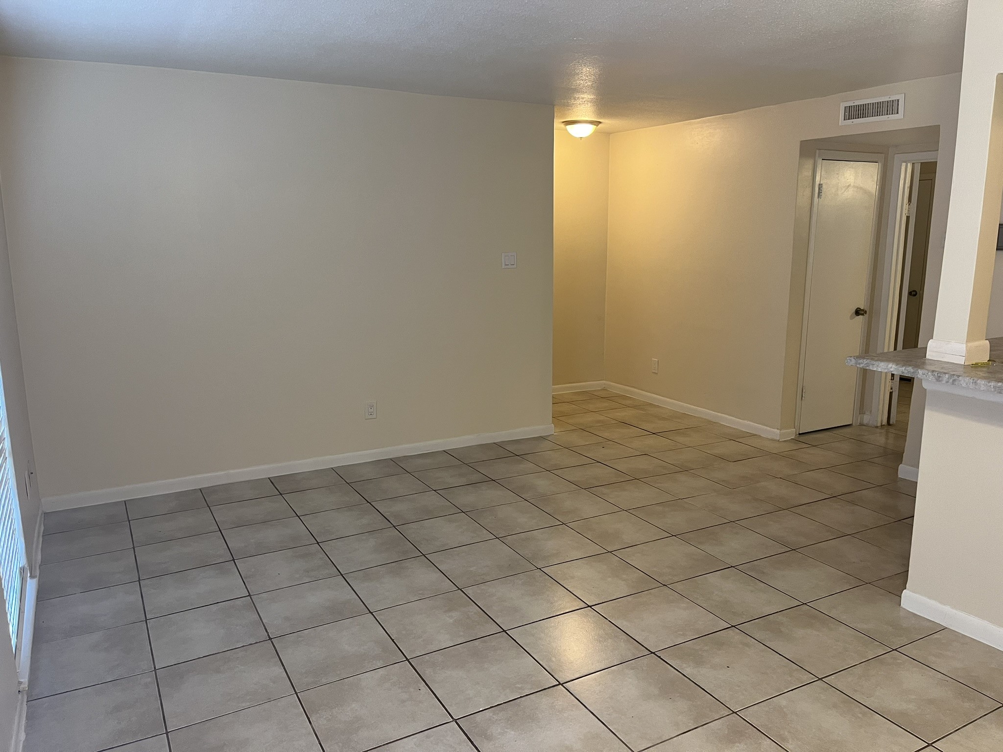 1275 Witte Road, Unit 14 Houston, TX 77055 - Photo 8 of 13 a view of an empty room and wooden floor