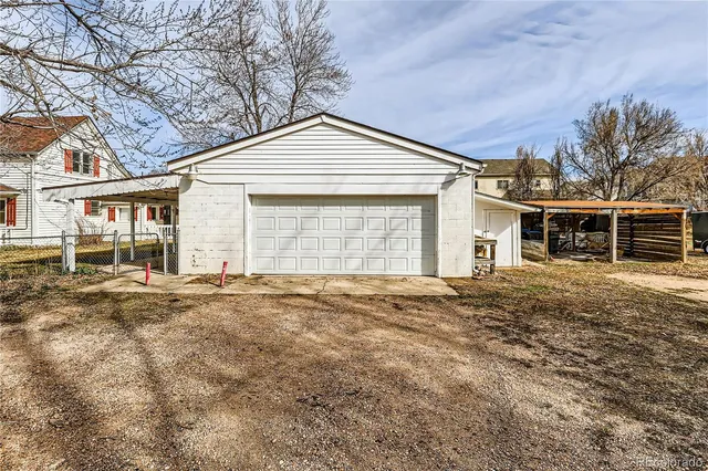 a kitchen with stainless steel appliances granite countertop a stove sink and microwave