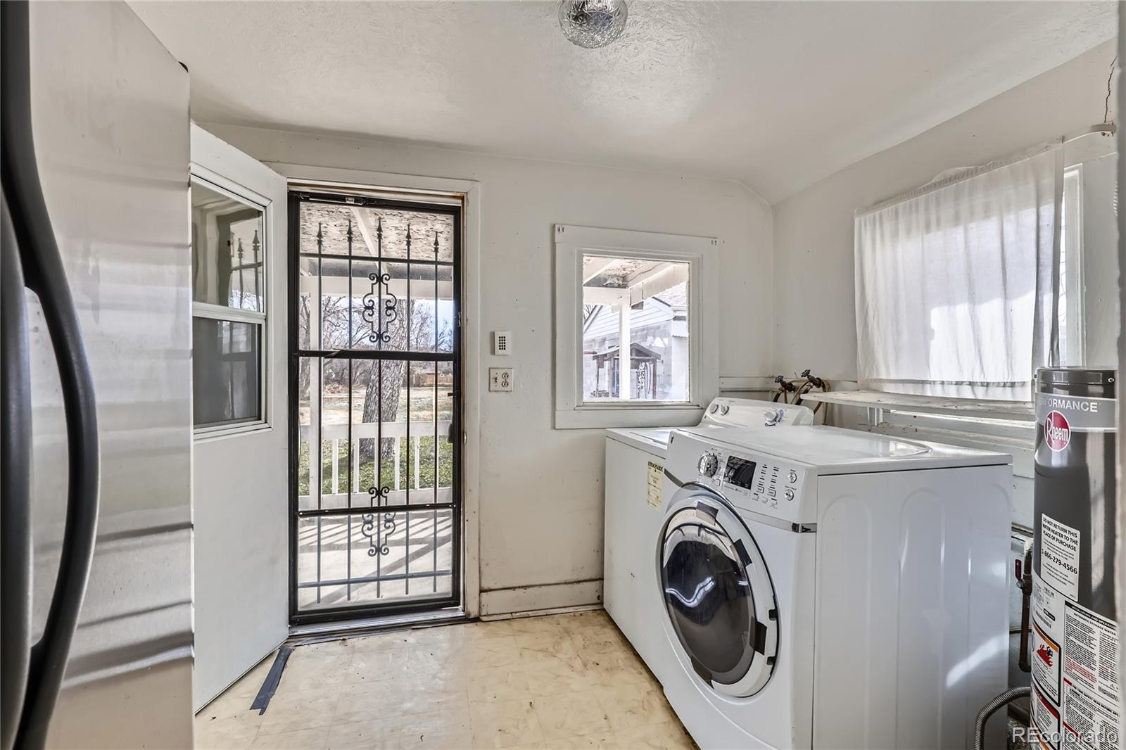 5300 Balsam Street Arvada, CO 80002 - Photo 17 of 29 a utility room with dryer and washer
