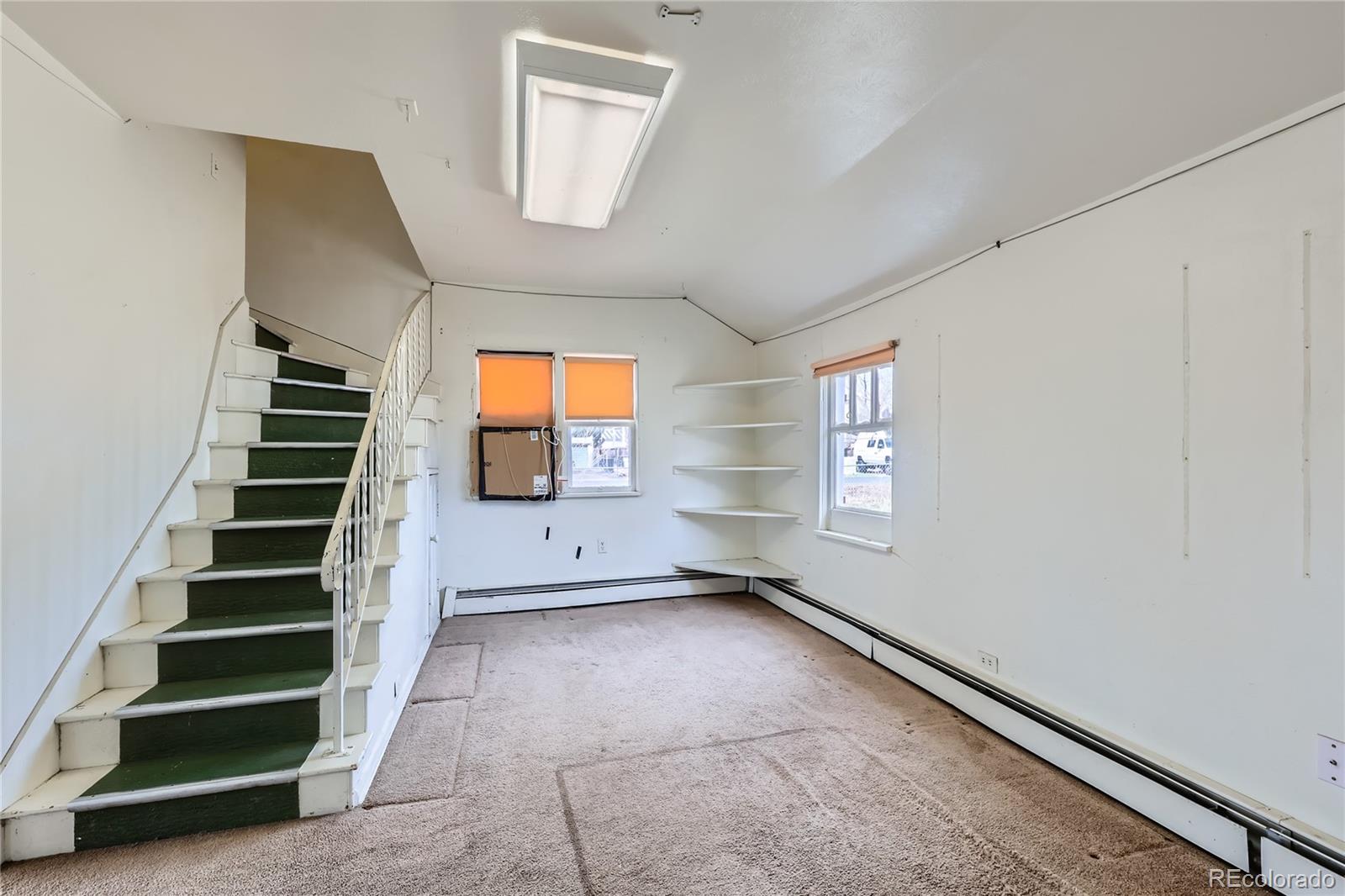 5300 Balsam Street Arvada, CO 80002 - Photo 18 of 29 a view of an entryway with staircase