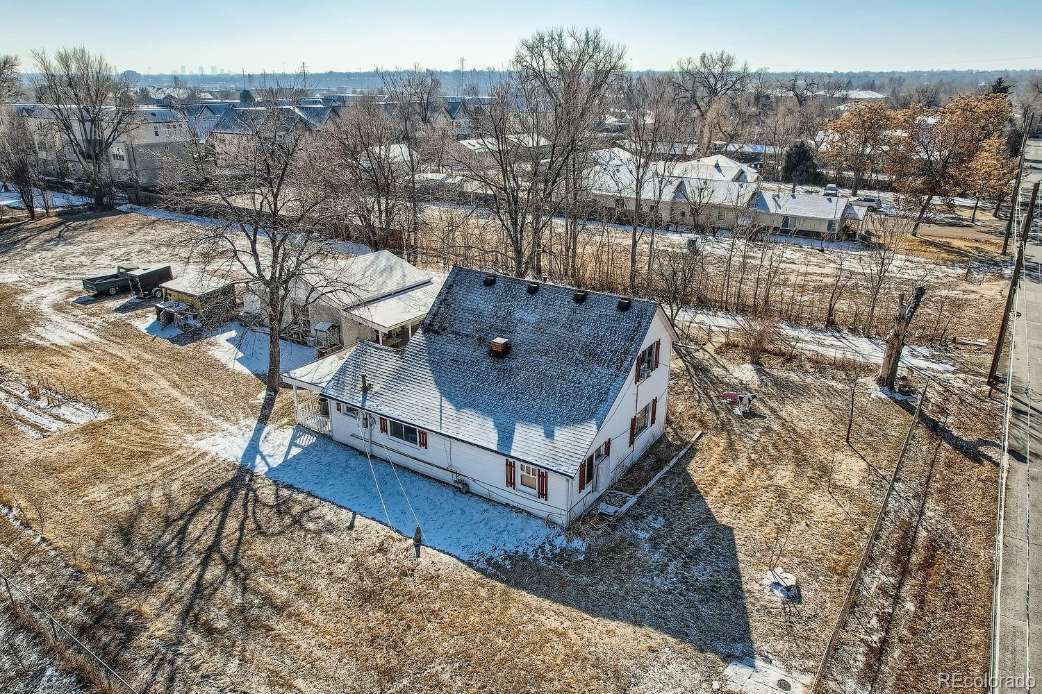 5300 Balsam Street Arvada, CO 80002 - Photo 27 of 29 a view of a house with a yard