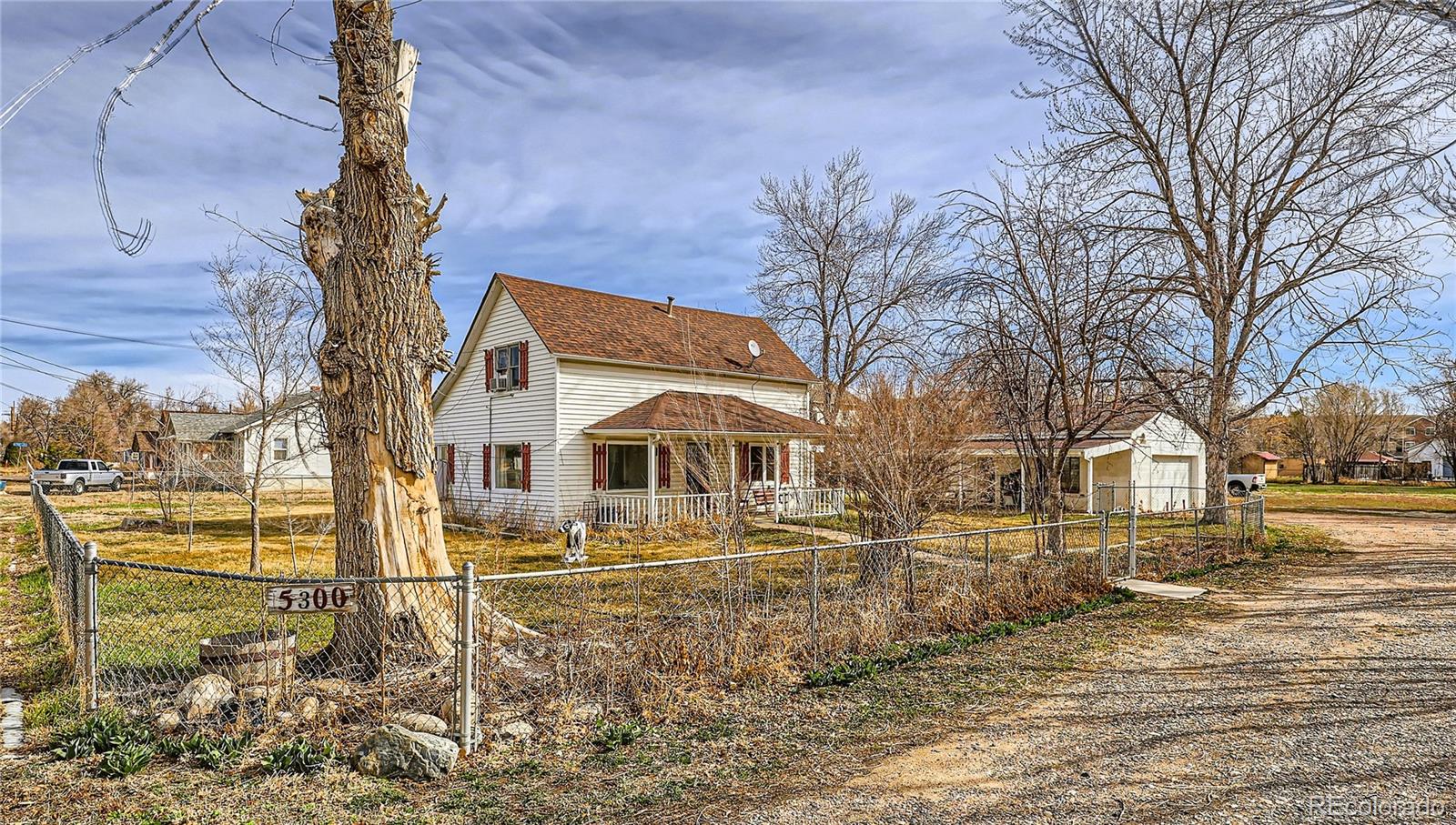 5300 Balsam Street Arvada, CO 80002 - Photo 3 of 29 a front view of a house with a yard