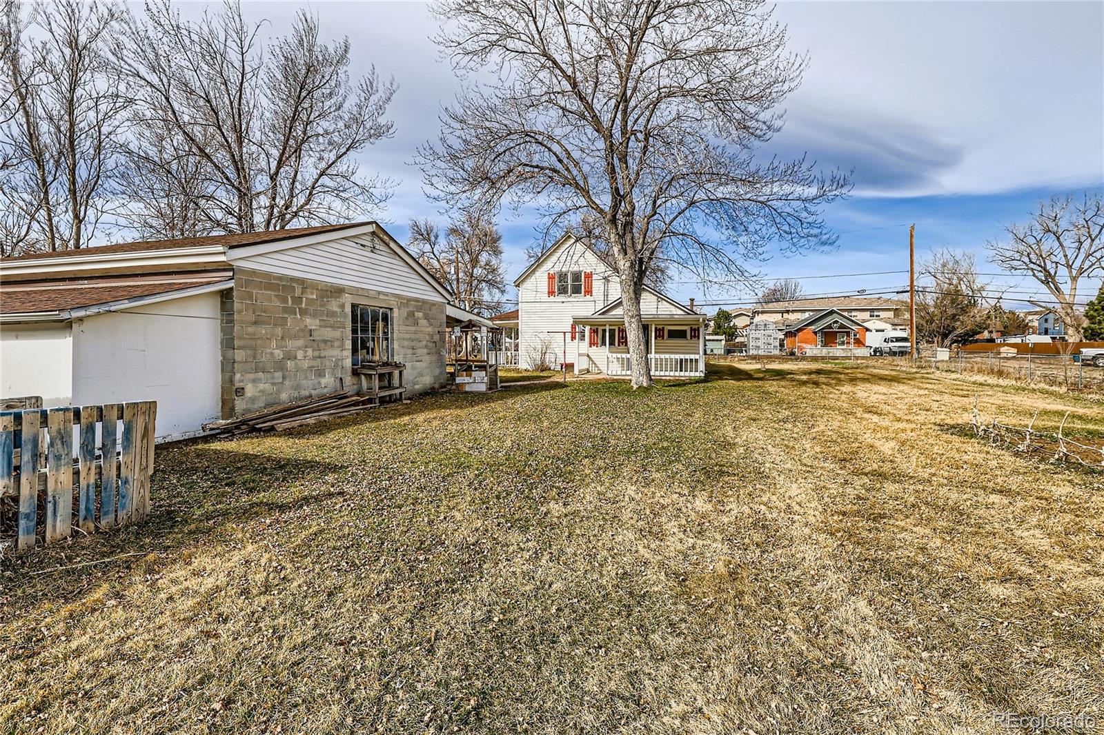 5300 Balsam Street Arvada, CO 80002 - Photo 4 of 29 a view of a yard with a house