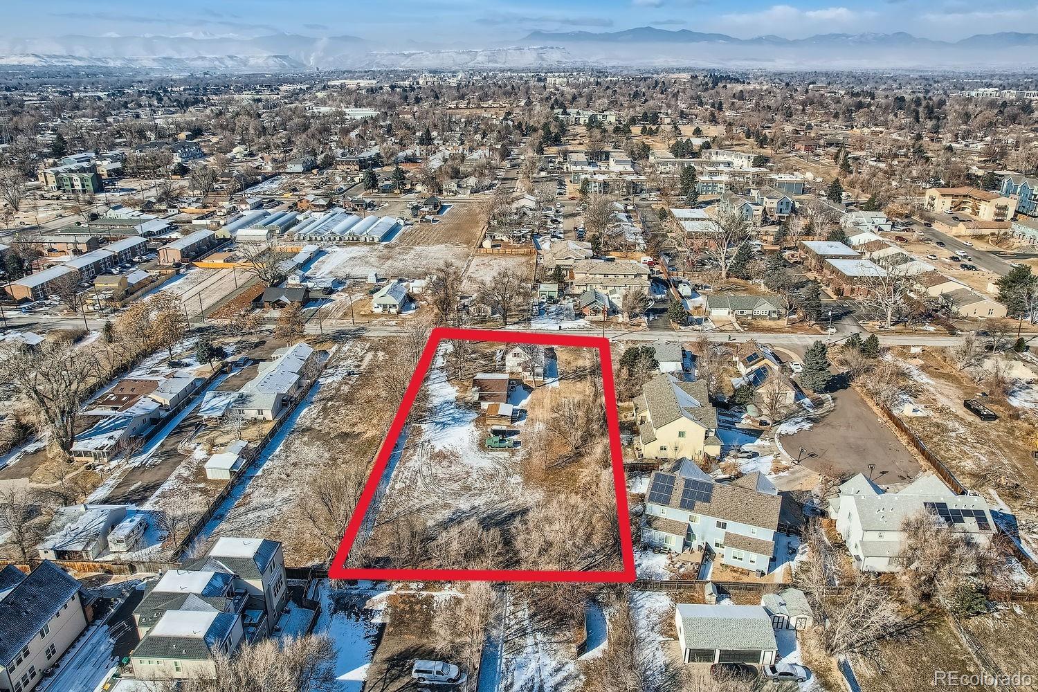 5300 Balsam Street Arvada, CO 80002 - Photo 9 of 29 an aerial view of residential houses with cars