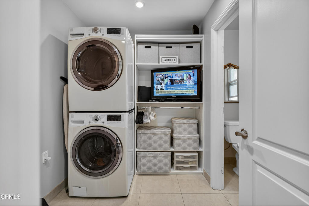 9325 La Shell Drive Tujunga, CA 91042 - Photo 41 of 46 a view of a storage & utility room with washer and dryer