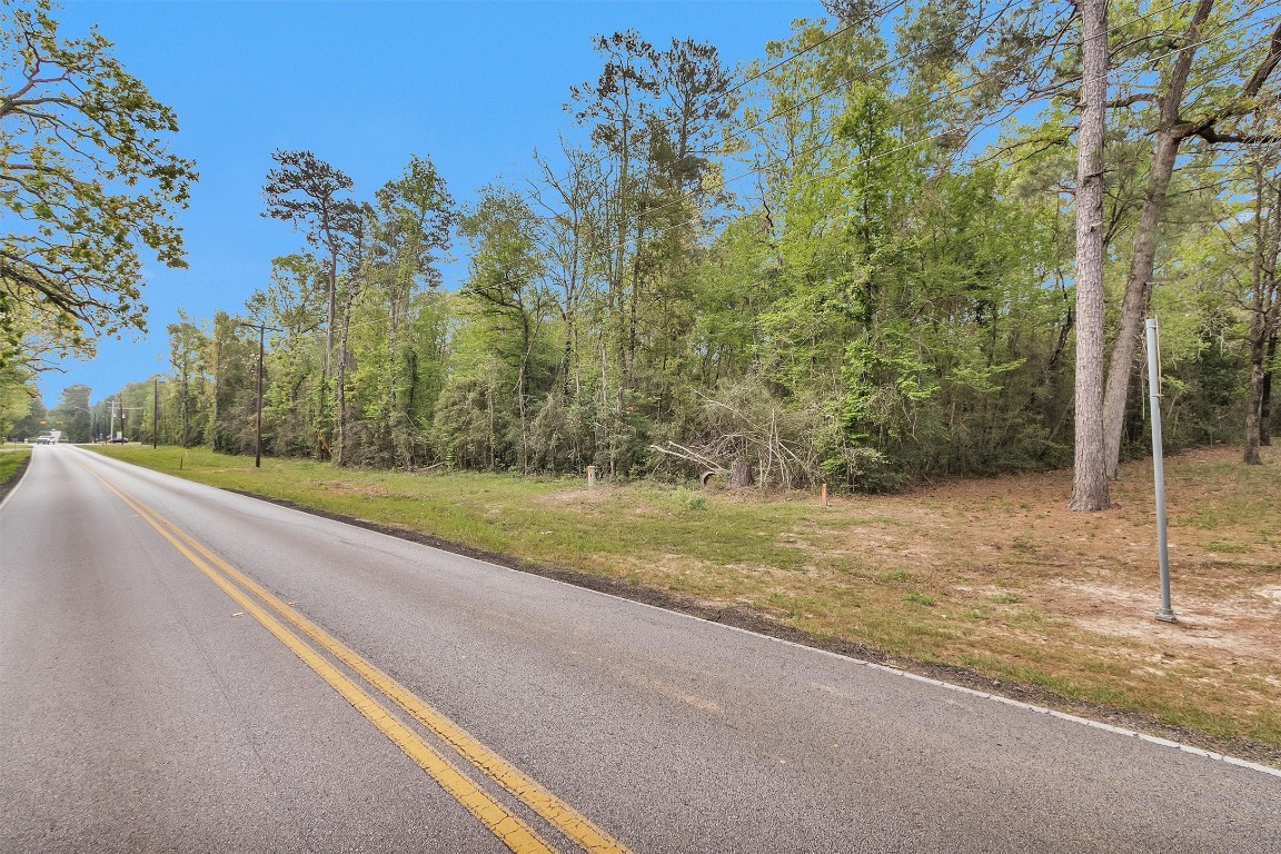 Tbd County Line Road Willis, TX 77378 - Photo 6 of 9 a view of a yard with basketball court