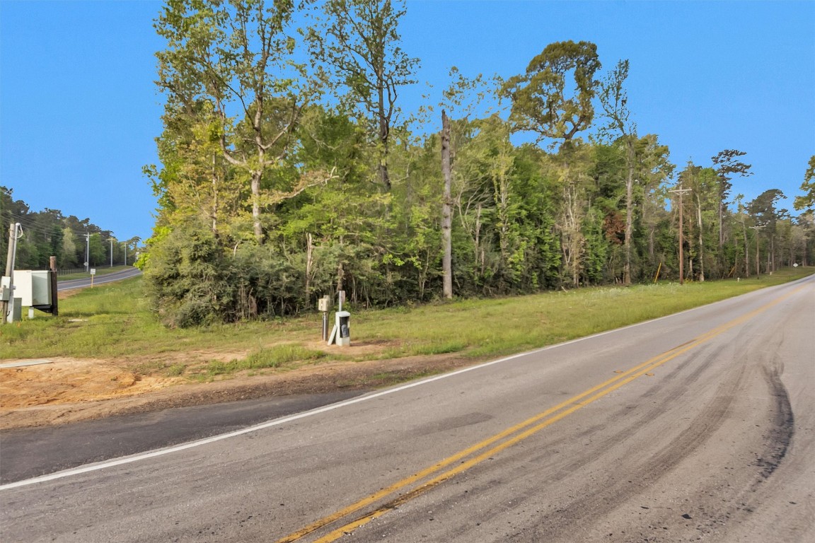 Tbd County Line Road Willis, TX 77378 - Photo 7 of 9 a view of a yard with basketball court