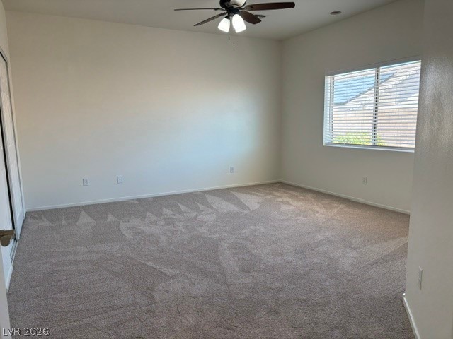 2866 Shimmering Bay Street Laughlin, NV 89029 - Photo 14 of 32 An airy bedroom with soft carpeting awaits your personal touch and design vision.