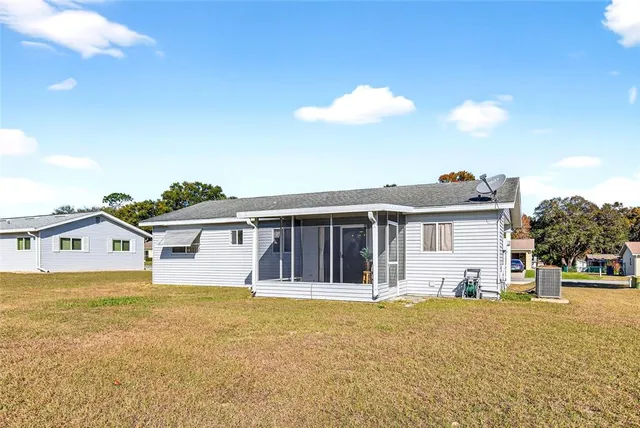 a view of a house with a swimming pool