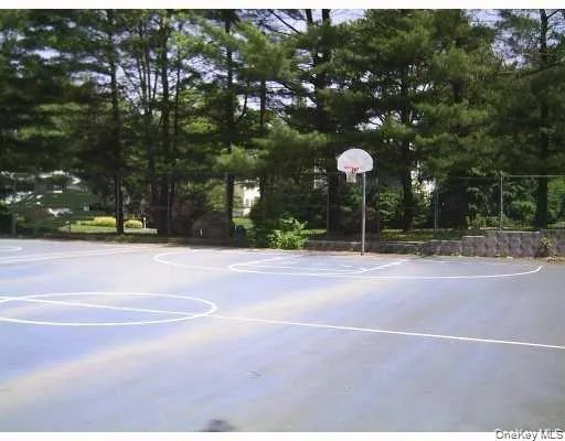 a view of a house with a yard and garage