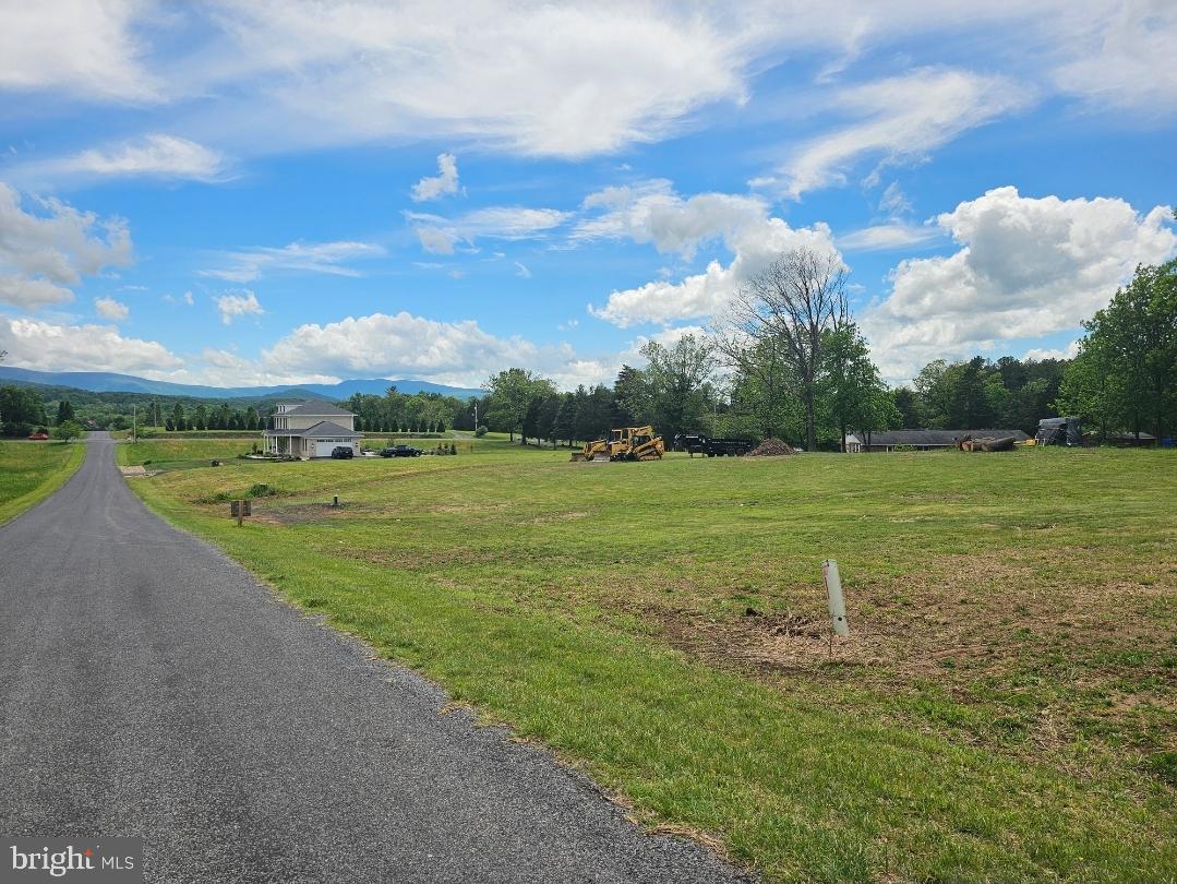Hatcher Drive Front Royal, VA 22630 - Photo 1 of 2 a view of a golf course with a lake