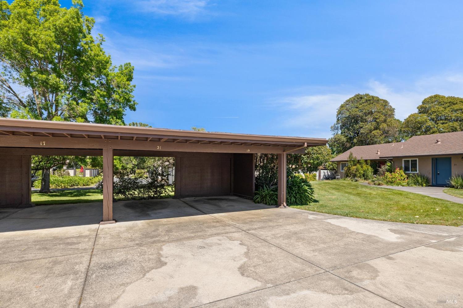 21 Vineyard Circle Sonoma, CA 95476 - Photo 21 of 23 a front view of a house with a yard and garage