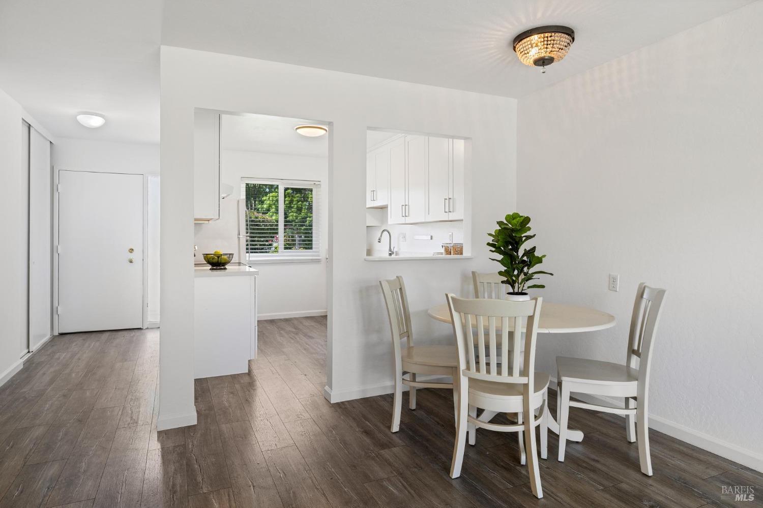 21 Vineyard Circle Sonoma, CA 95476 - Photo 5 of 23 a view of a dining room with furniture and wooden floor