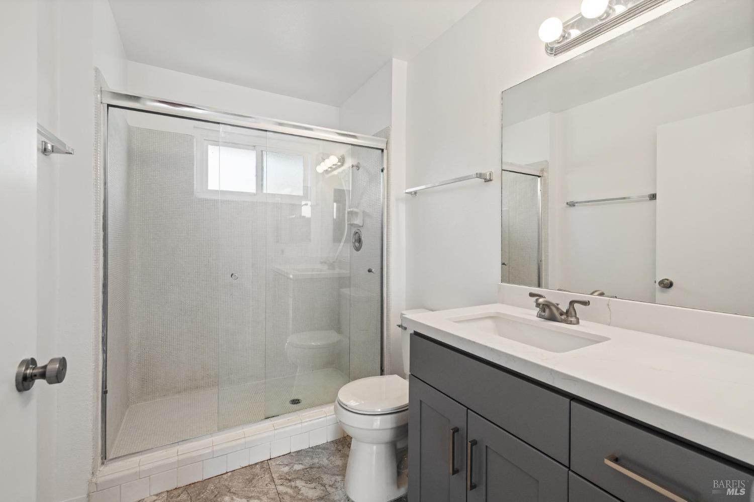 21 Vineyard Circle Sonoma, CA 95476 - Photo 10 of 23 a bathroom with a sink a toilet and shower