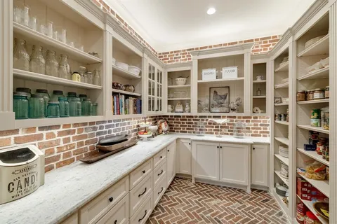 a kitchen with a stove and a sink