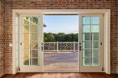 a view of balcony with a large window
