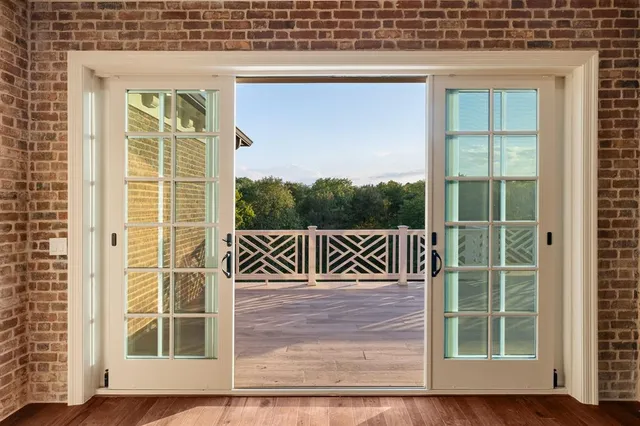 a view of balcony with a large window