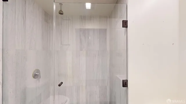 a view of a living room and hardwood floor