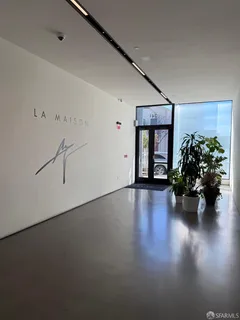 a view of a chairs and tables in a terrace