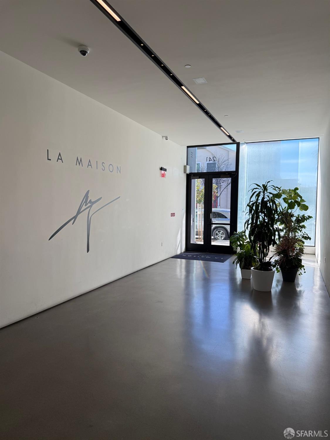 241 10th Street, Unit 305 San Francisco, CA 94103 - Photo 14 of 16 a view of a living room and hardwood floor