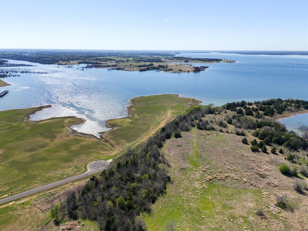 0 Lakeshore Terrace Windom, TX 75492 - Photo 5 of 35 a view of a lake with a mountain