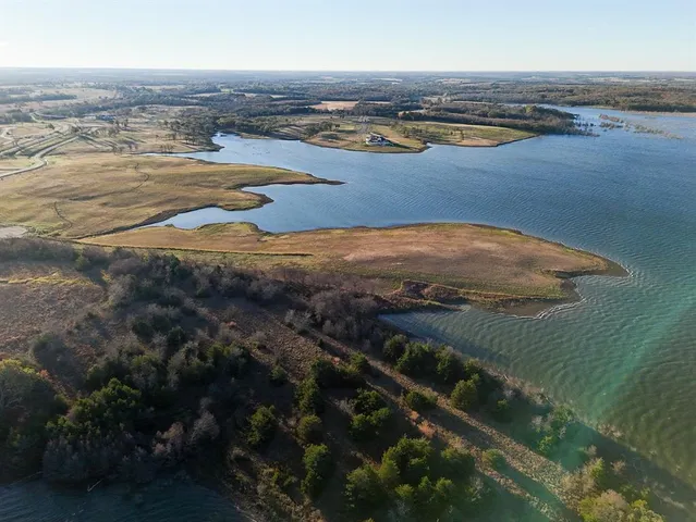 a view of an ocean and city