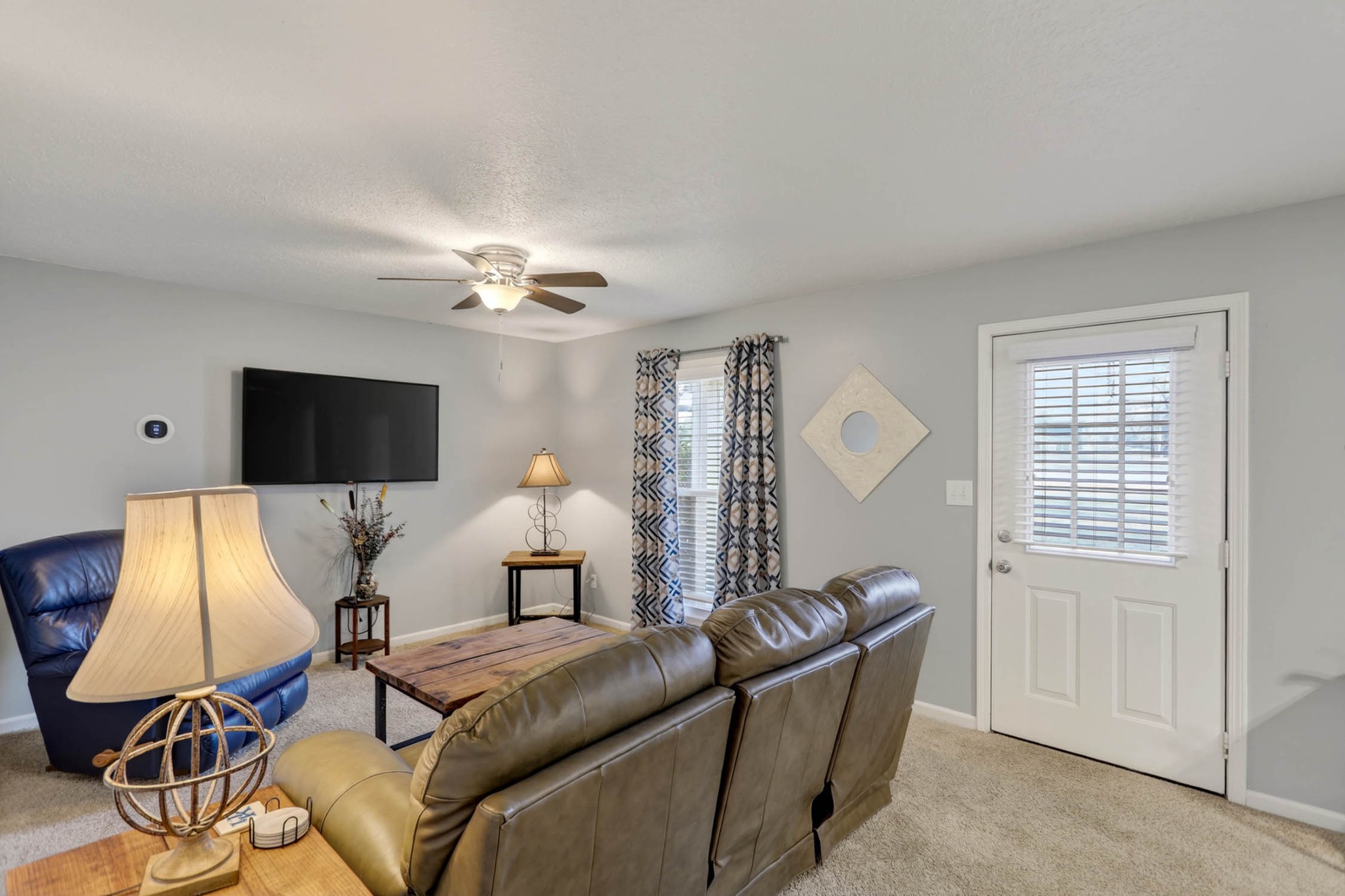 257 North Fairway Road Franklin, KY 42134 - Photo 11 of 30 a living room with furniture and a flat screen tv